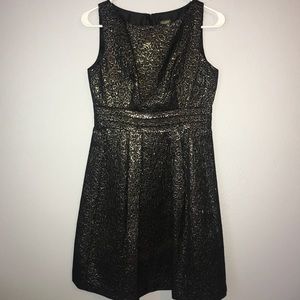 Sparkly black dress with gold tone
